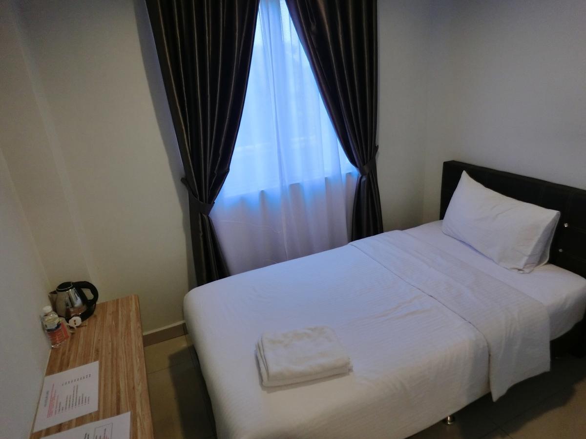Nah Hotel Skudai Quarto foto